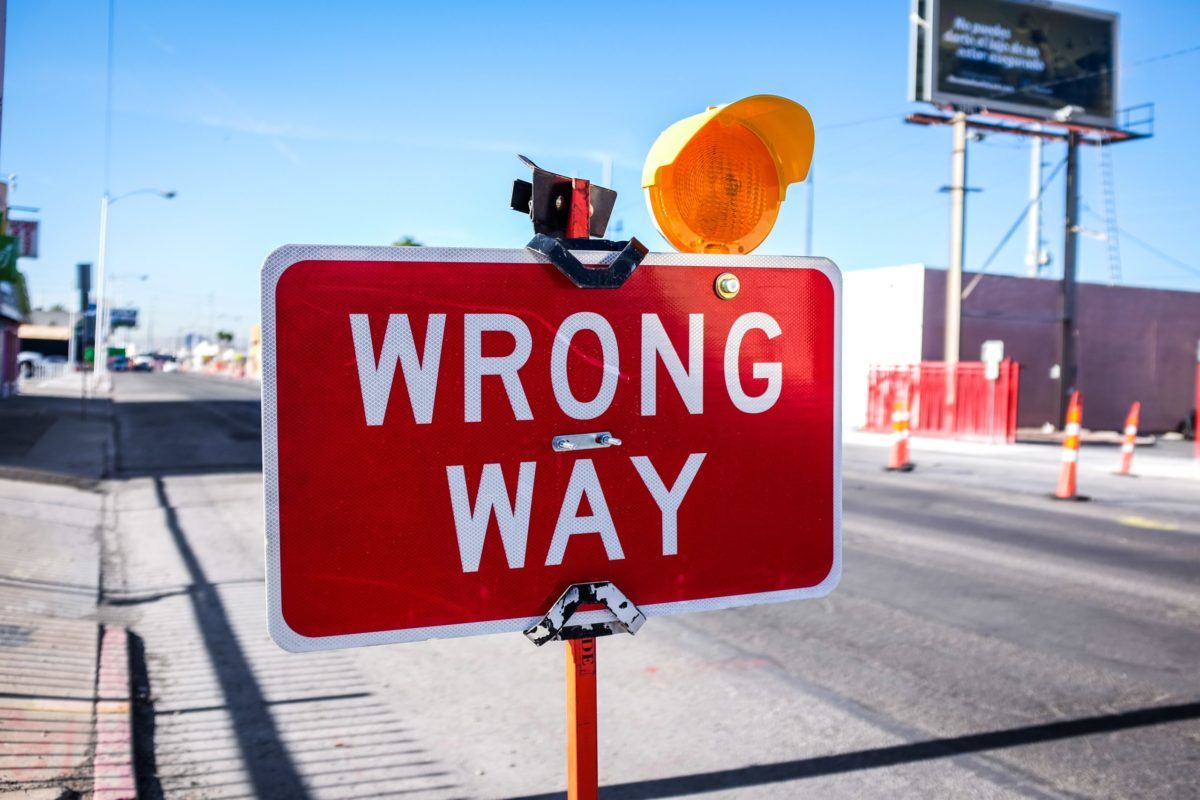 construction sign saying wrong way to avoid will writing mistakes